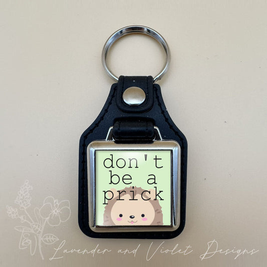 DONT BE A PRICK VINYL KEYCHAIN SQUARE
