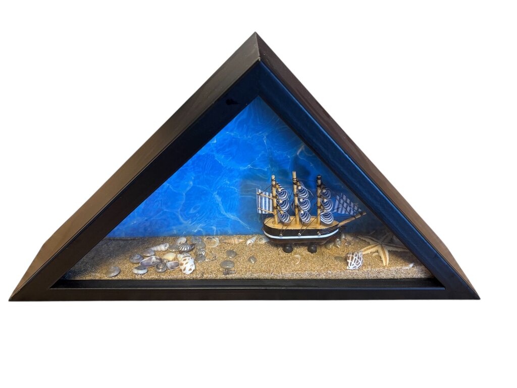 triangle beach scene. with shells and ship