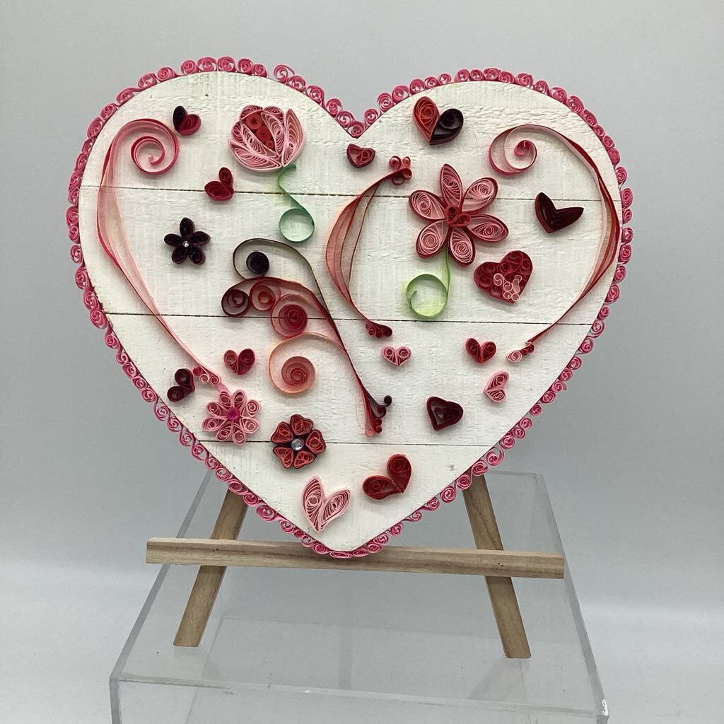 Heart shaped wood with honeycomb edge and pink and burgundy flowers