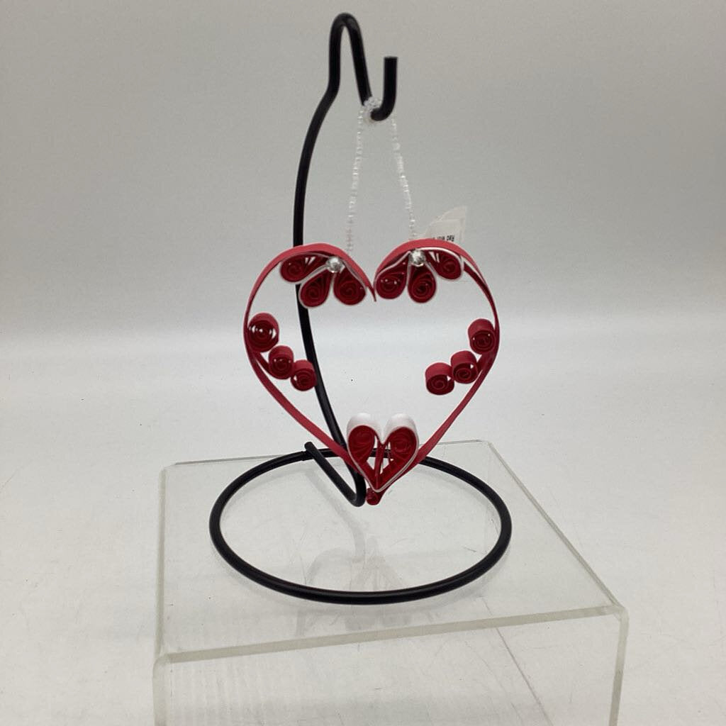 Red with white heart shaped ornament