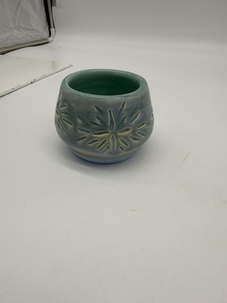 Blue carved votive holder