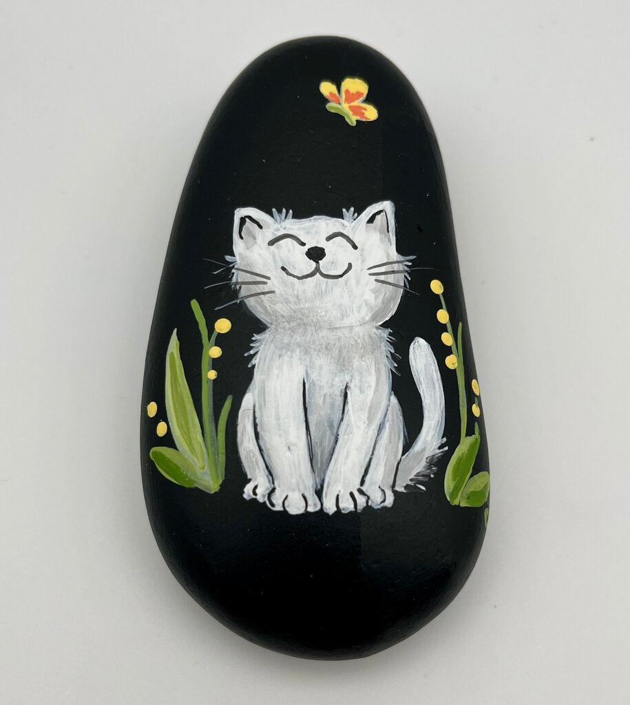 Rock large black w/white cat