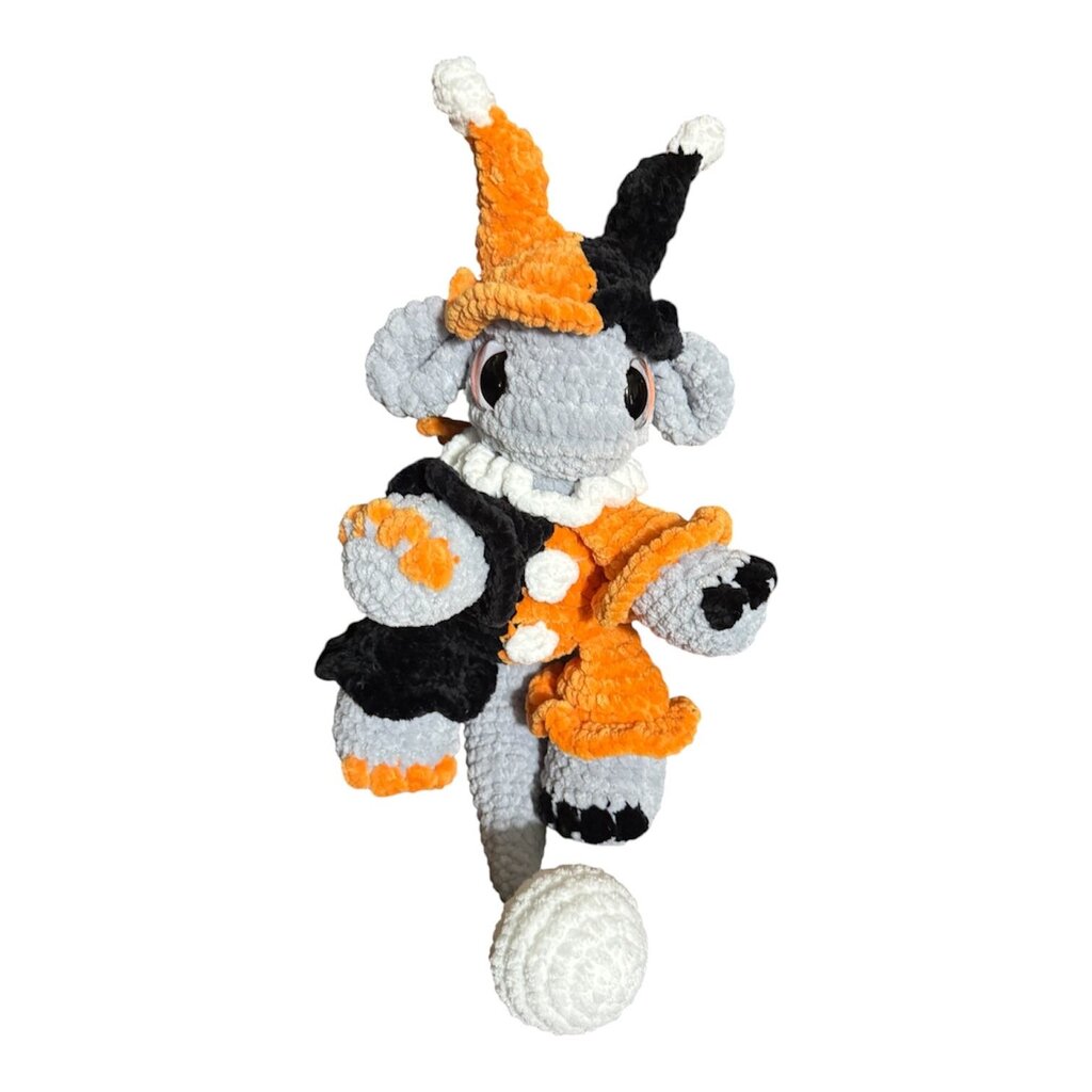 Crocheted jester dragon plushie