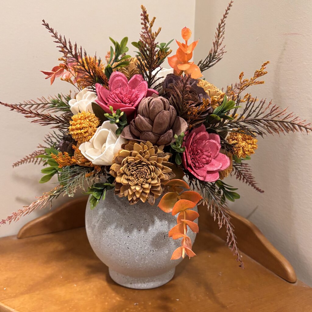 Round Vase filled with Pink, Yellow and Brown Sola Wood Flowers