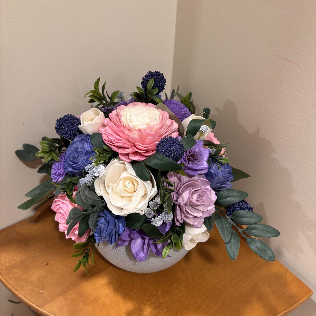 Round Vase filled with Pink, Blue and Purple Sola Wood Flowers