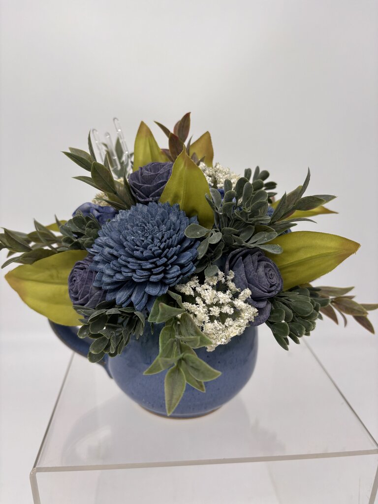 Blue Cup filled with Blue Sola Wood Flowers and White Accents