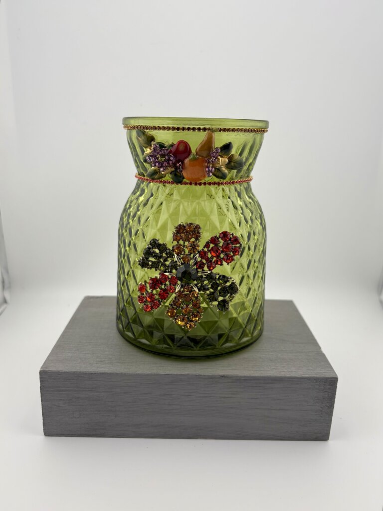 Green beveled 6in glass vase w/decorative flower & fall accent