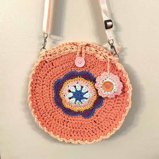 Peach full circle crossybody purse with adj strap