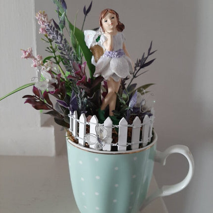 469-green pokadot mug. fairy garden