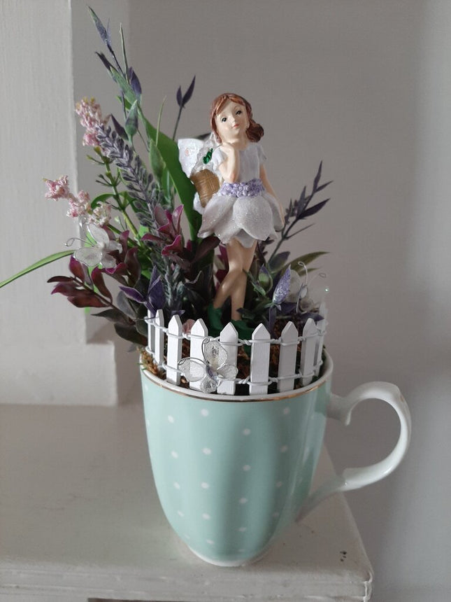 469-green pokadot mug. fairy garden