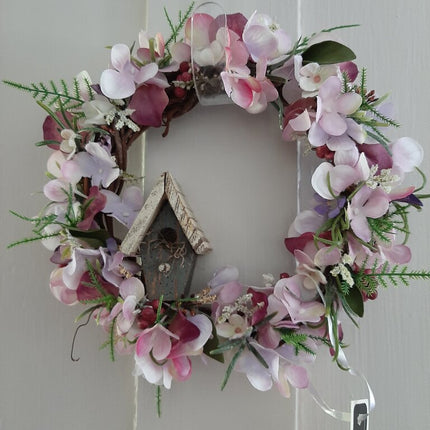 548- pink wreath with bird house