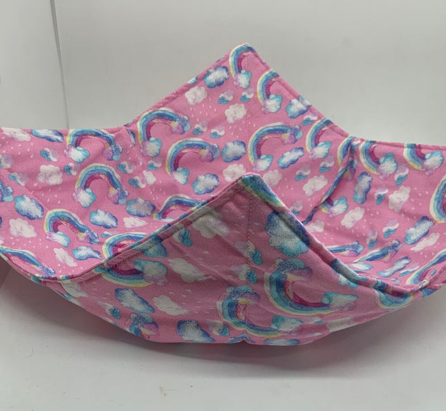 DC pink with rainbows and clouds