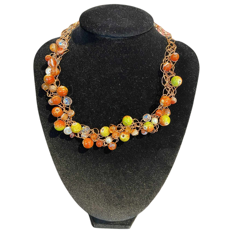Crochet necklace with apple color beads and crystal