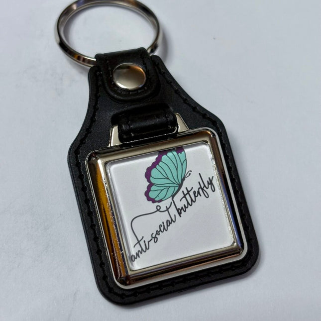 ANTISOCIAL BUTTERFLY VINYL KEYCHAIN SQUARE