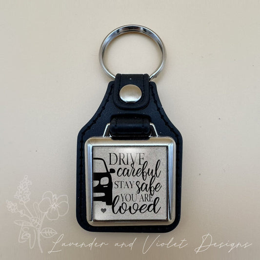 DRIVE CAREFUL VINYL KEYCHAIN SQUARE