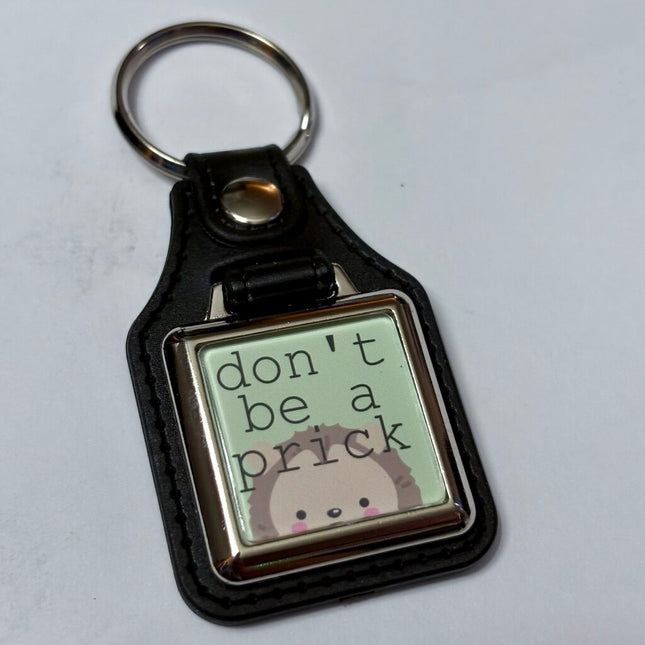 DONT BE A PRICK VINYL KEYCHAIN SQUARE