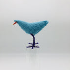 Sky blue with purple legs