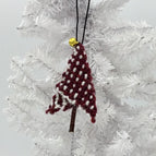 Burgundy and white with gold tone bell topper