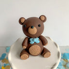 brown with light blue bow