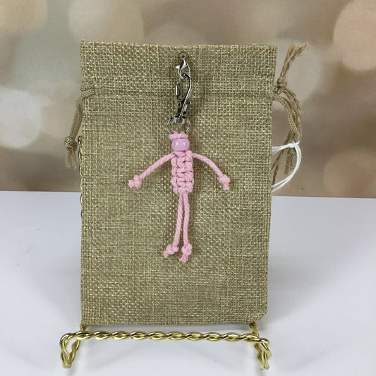 Gift bag with pink stick figure clip-on