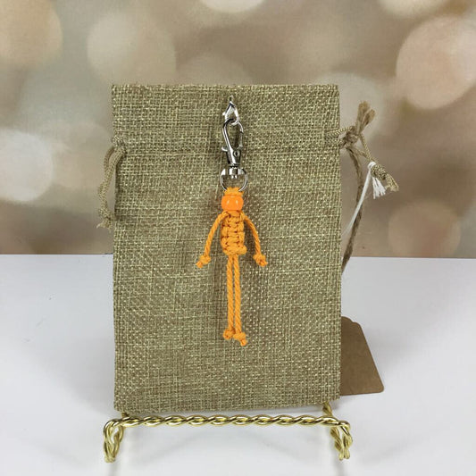 Gift bag with orange stick figure clip-on