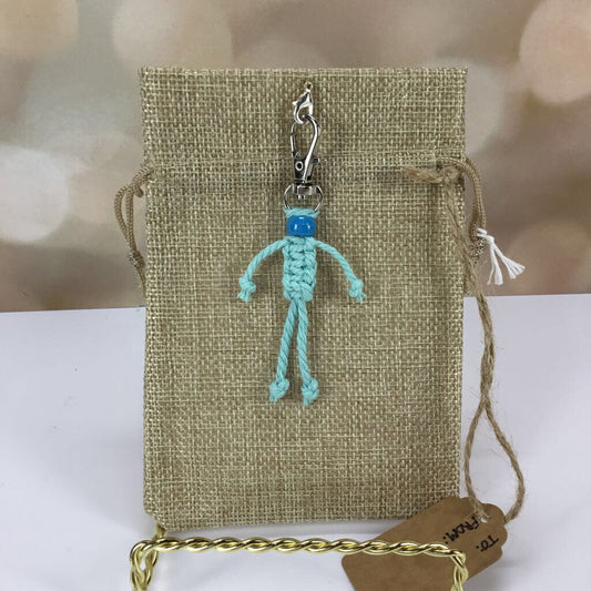 Gift bag with light blue stick figure clip-on