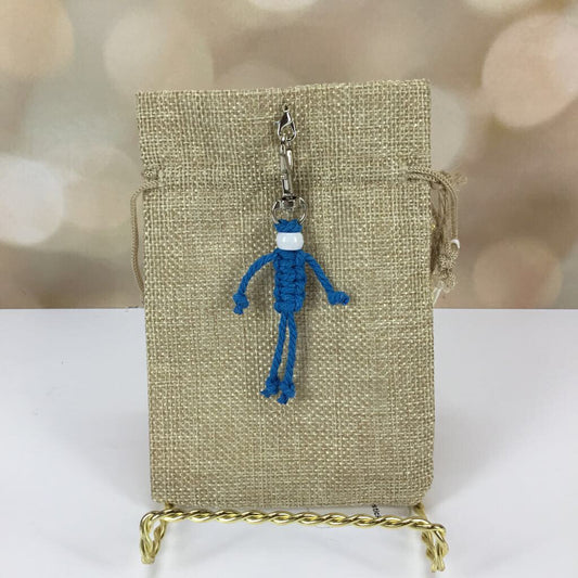 Gift bag with blue stick figure clip-on