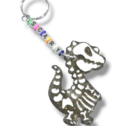 SKELETON DINO KEYCHAIN