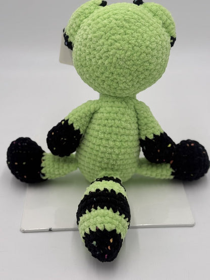 Crocheted neon green raccoon