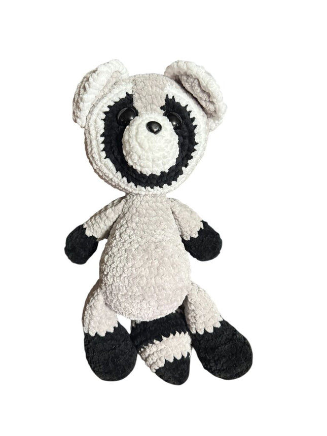 Crocheted raccoon plushie