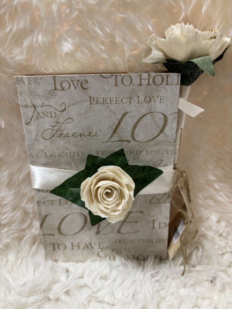 Notebook w/ pen featuring a soft close magnet in Wedding sayings with white flowers and ribbon