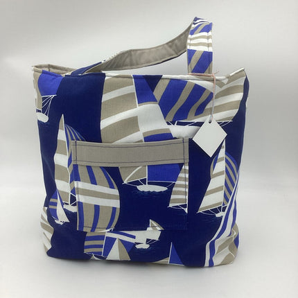 Medium sailboat w/ tan reversible tote bag