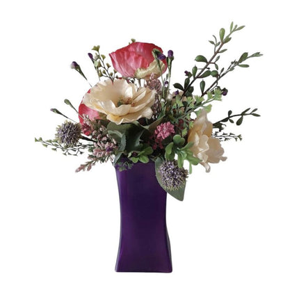 482-purple vase with yellow and hot pink poppies