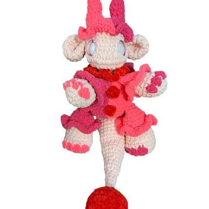Crocheted jester dragon plushie