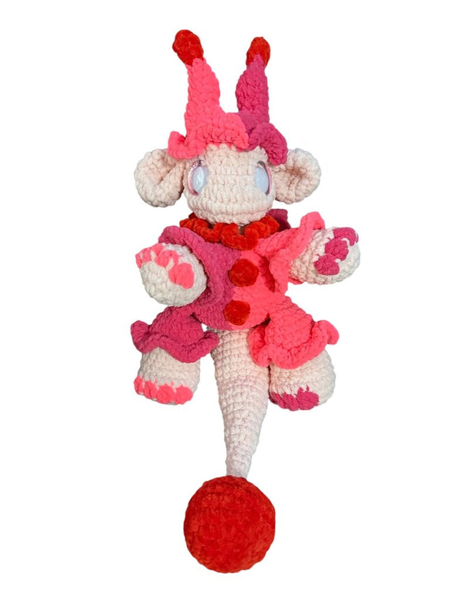 Crocheted jester dragon plushie