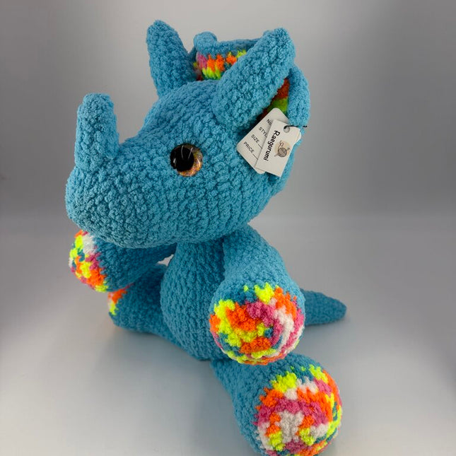 Crocheted triceratops plushie