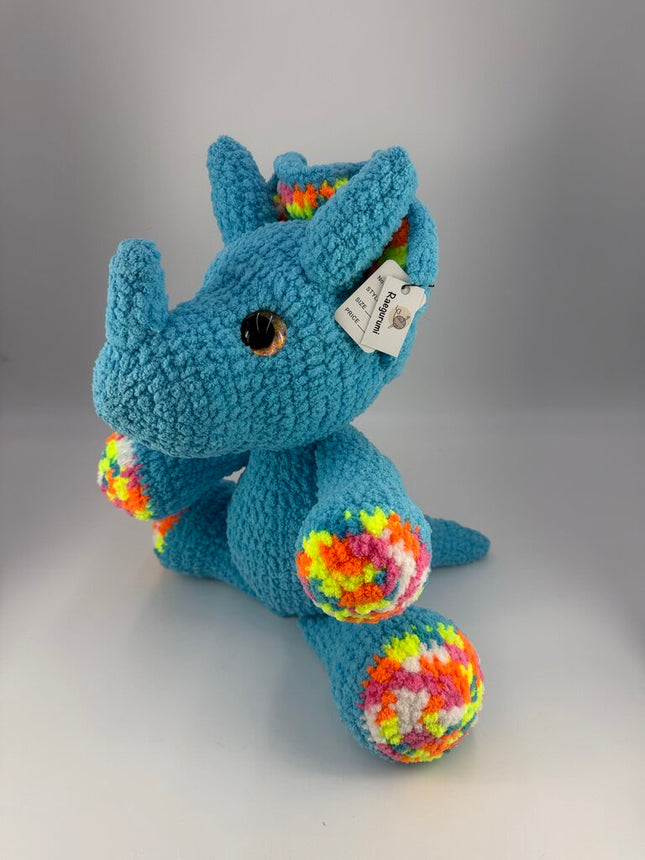Crocheted triceratops plushie