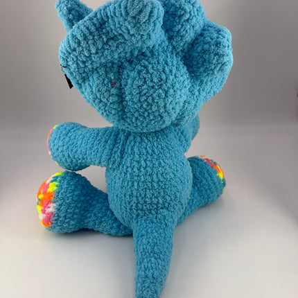 Crocheted triceratops plushie