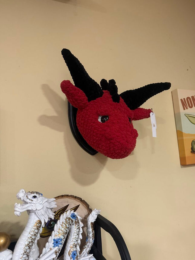 Crocheted dragon head plaque