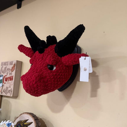 Crocheted dragon head plaque