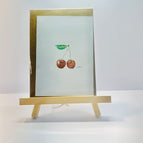 Brown envelope, white card