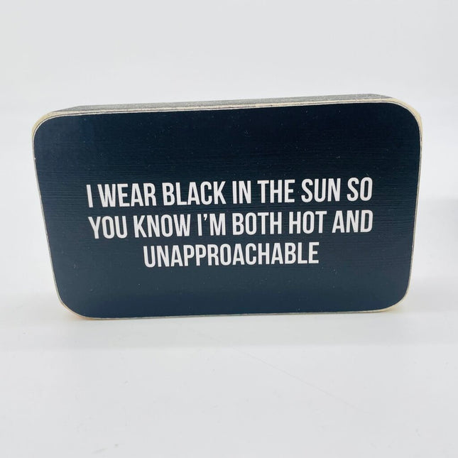 Wear black in sun box sign