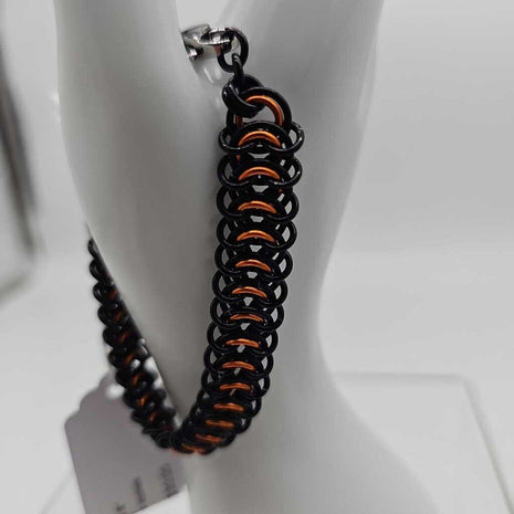 8" Black Orange Vertebrae Bracelet