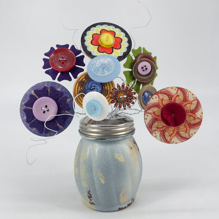 19.50 blue button flower