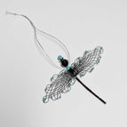 Black with teal beads and black body