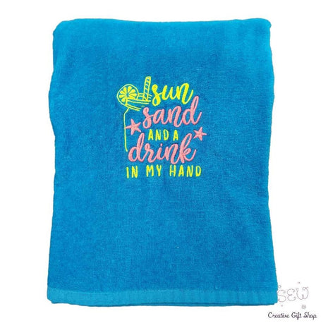 Sun and sand and a drink in my hand Beach Towel
