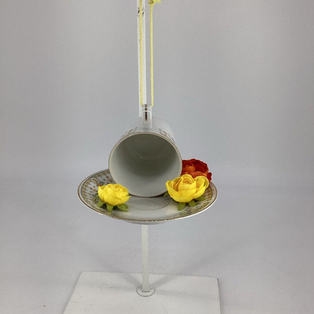 teacup bird feeders