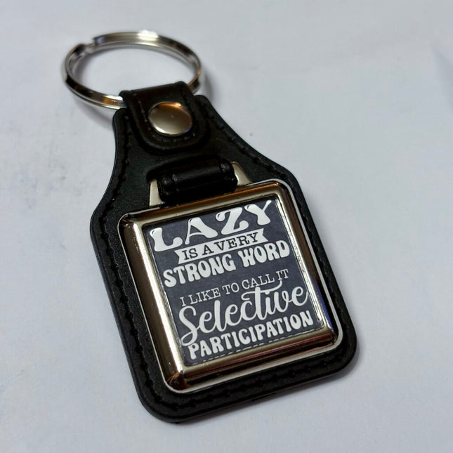 SELECTIVE PARTICIPATION VINYL KEYCHAIN SQUARE
