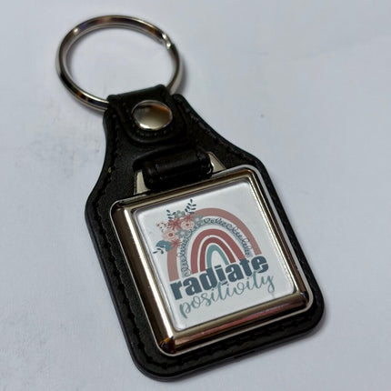 RADIATE POSITIVITY VINYL KEYCHAIN SQUARE