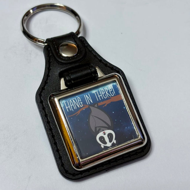 HANG IN THERE VINYL KEYCHAIN SQUARE
